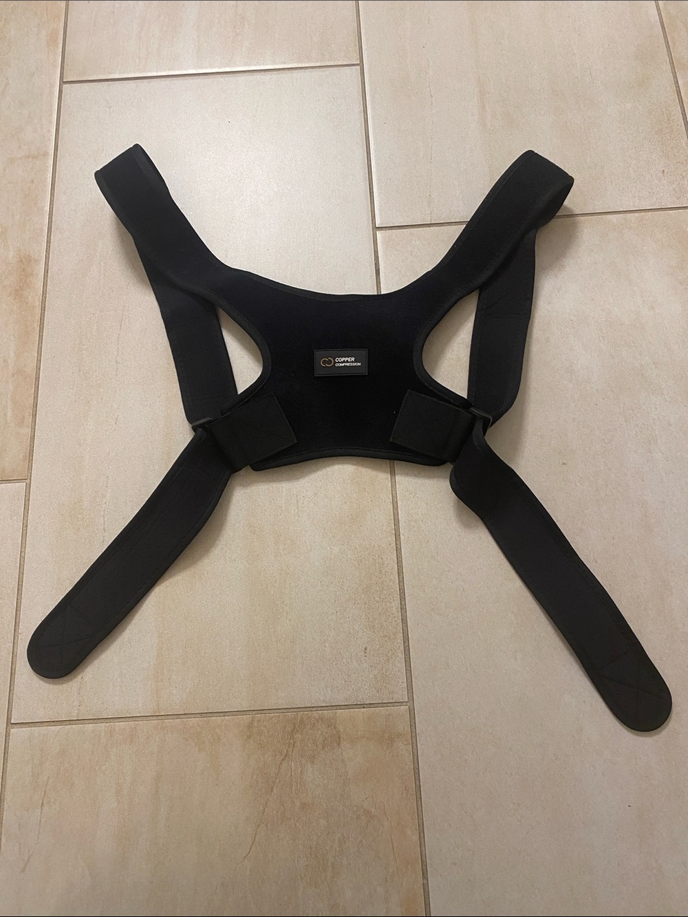 Copper Compression Black Posture Corrector Brace for men or women.